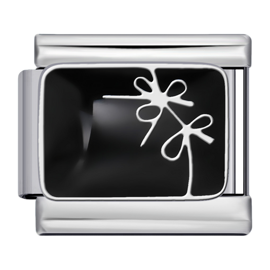 C1155_Silver Bows on Black Background.png